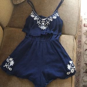 Beautiful navy lined embroidered romper in S